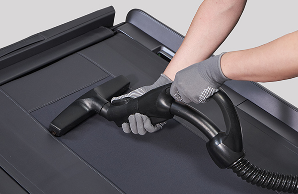 Service Step 2: Vacuum cleaning the Berex Massage Bed for maintenance