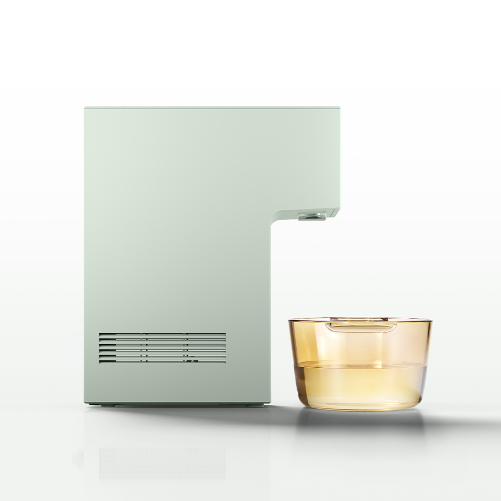 The side view of Dazzie black compact water purifier in Mint Green | Coway Malaysia